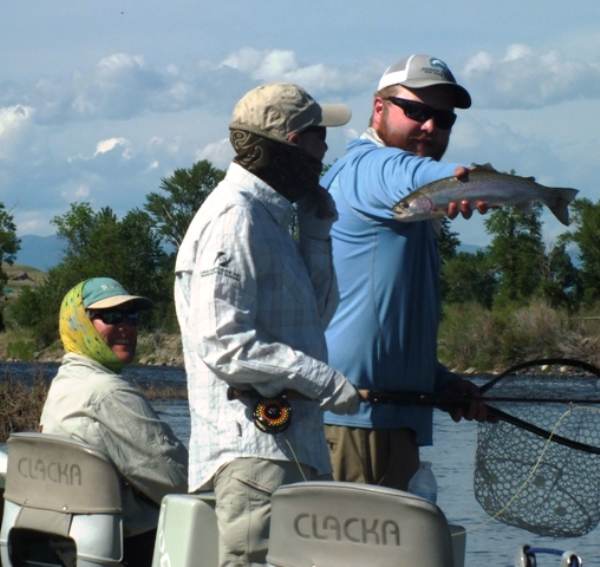 Sue Clark lands her Rainbow Trout